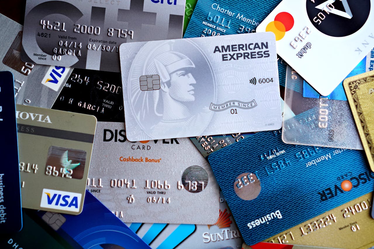 Mastering the First Impression: Your intriguing post title goes here Close-up image of various credit and debit cards including Visa, MasterCard, American Express, and Discover.